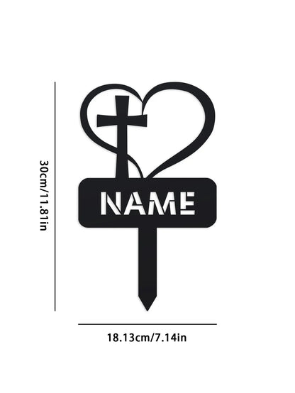 Black cross and heart design with 'NAME' text on a white background