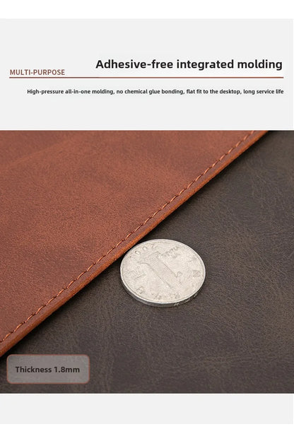 Brown leather-bound product with adhesive-free integrated molding, showing a coin for scale.