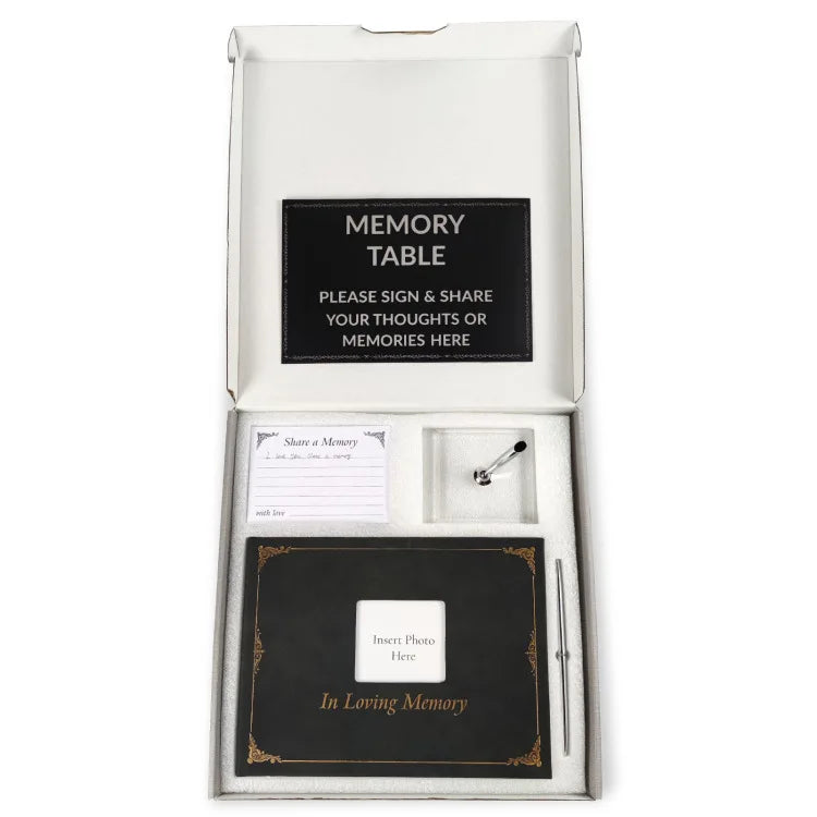 Memory table kit with sign, pen, and photo insert on a white background