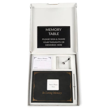 Memory table kit with sign, pen, and photo insert on a white background
