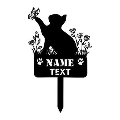 Black silhouette of a cat with flowers and butterflies on a white background