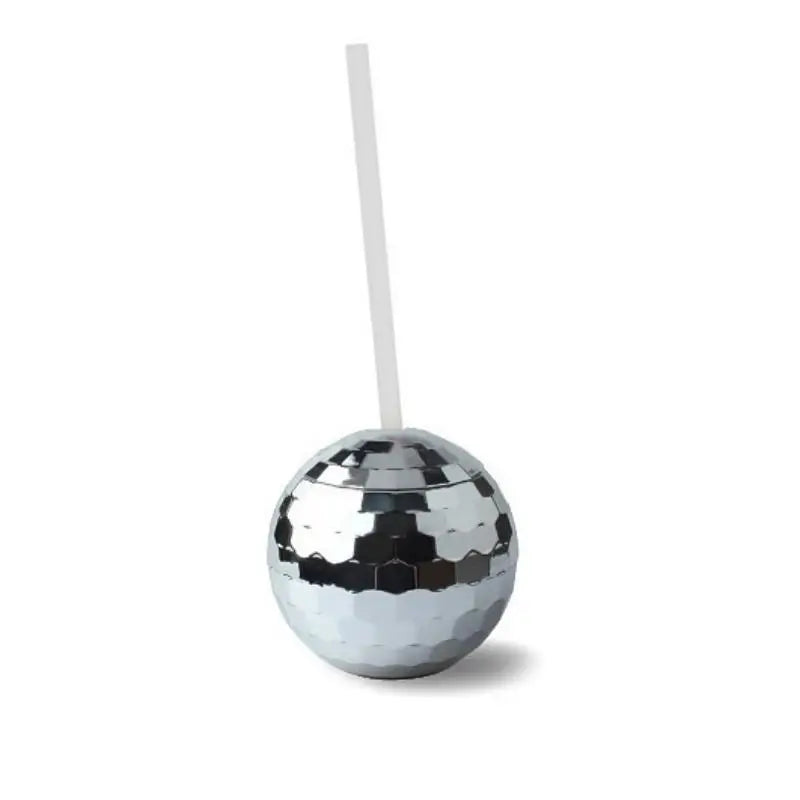 Silver disco ball with a straw on a white background
