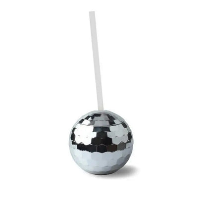Silver disco ball with a straw on a white background