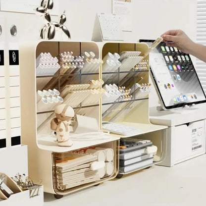Beige desk organizer with shelves and a person using a tablet on a white desk.