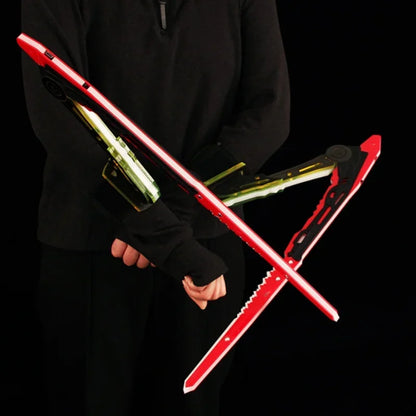 Person holding a red and black crossbow against a black background