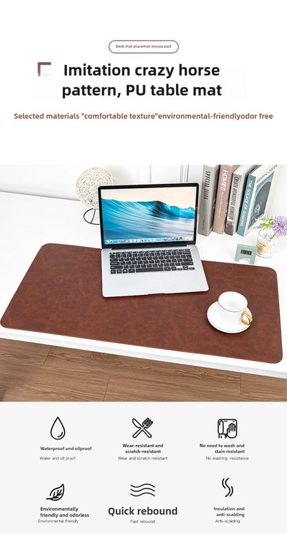 Brown PU table mat with a laptop on a wooden desk, books in the background