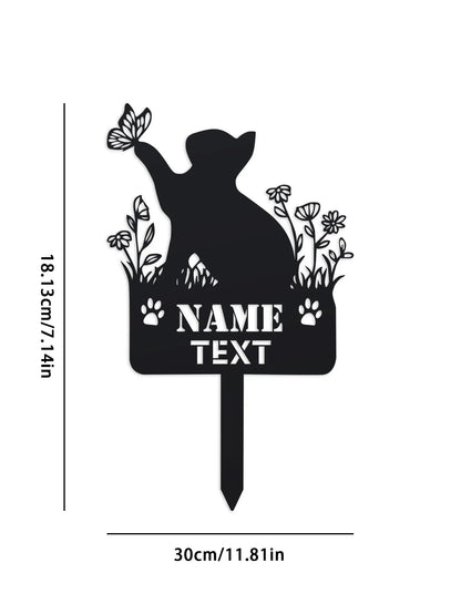 Black silhouette of a cat with flowers and butterfly on a white background