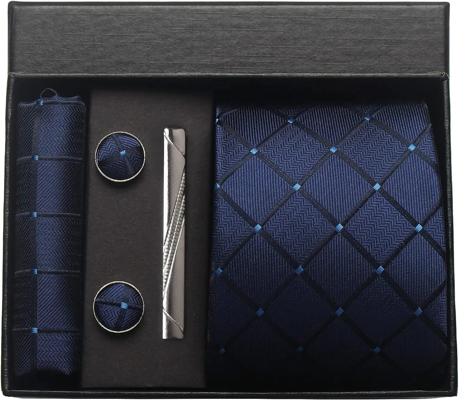 Navy blue tie set with matching accessories in a black box